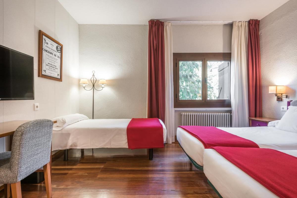 Cama o camas de una habitación en Snö Hotel Formigal