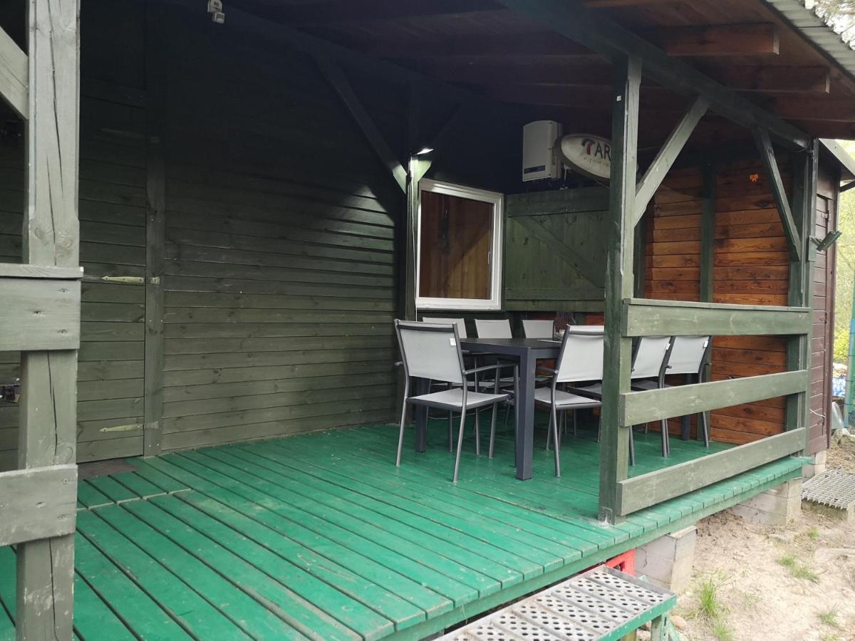 domki nad jeziorem, las, do 10 osób jezioro Wilczyńskie Budzisławskie - domek letniskowy osobno ogrodzony, ogrzewany mile widziane pieski, zwierzeta- wielkopolska, 62-550 Zygmuntowo gm Wilczyn - Housity