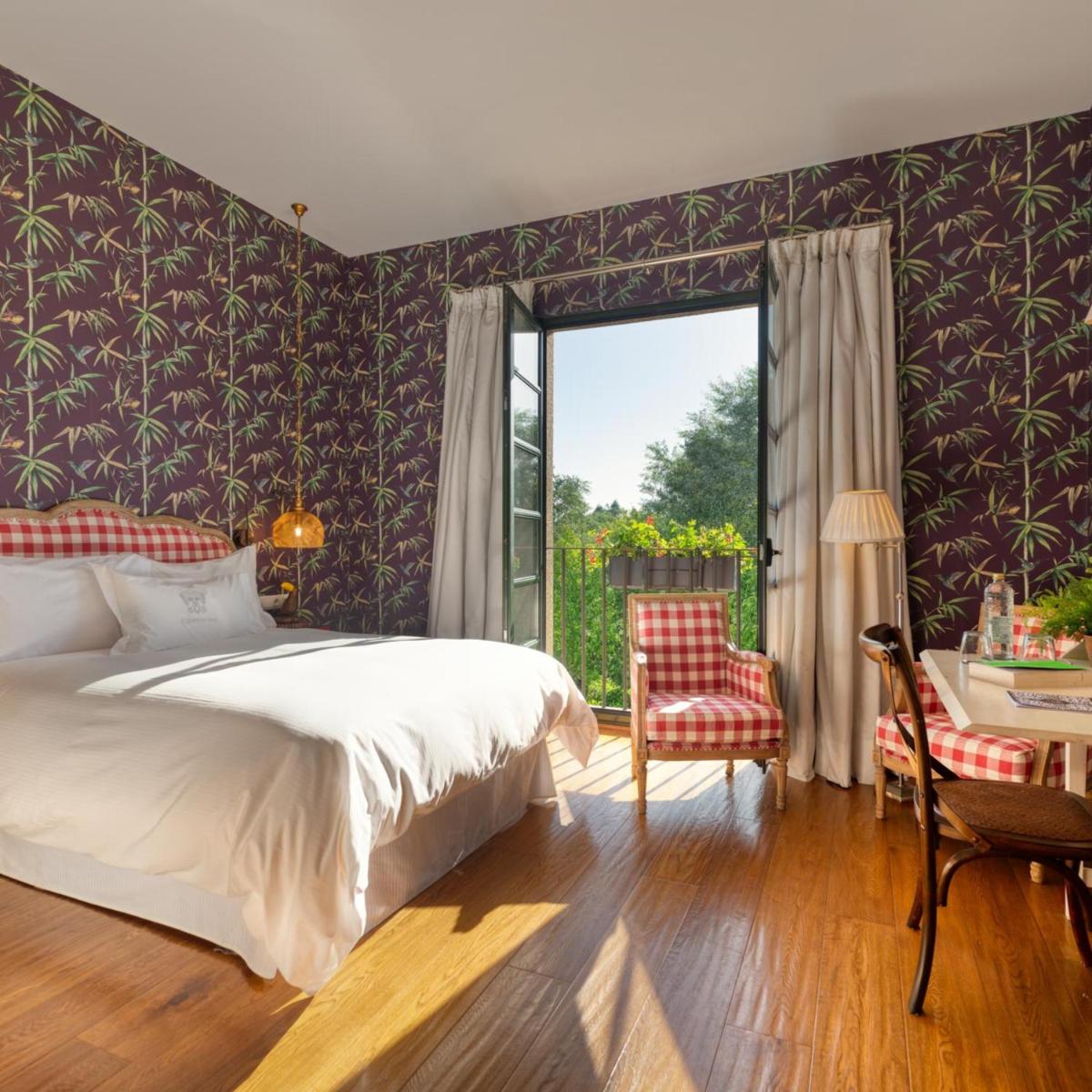 Cama o camas de una habitación en A Quinta Da Auga Hotel Spa Relais & Chateaux