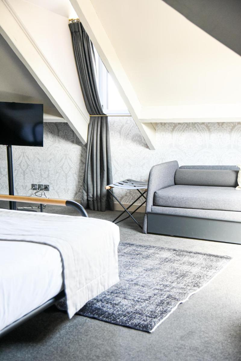 Un ou plusieurs lits dans un hébergement de l'établissement Le Général d'Elbée Hotel & Spa - Teritoria