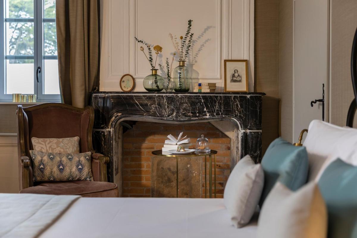 Un ou plusieurs lits dans un hébergement de l'établissement Le Général d'Elbée Hotel & Spa - Teritoria