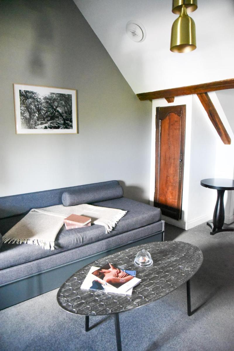 Coin salon dans l'établissement Le Général d'Elbée Hotel & Spa - Teritoria