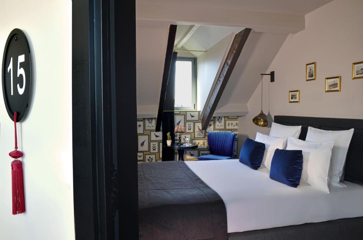 Un ou plusieurs lits dans un hébergement de l'établissement Le Général d'Elbée Hotel & Spa - Teritoria