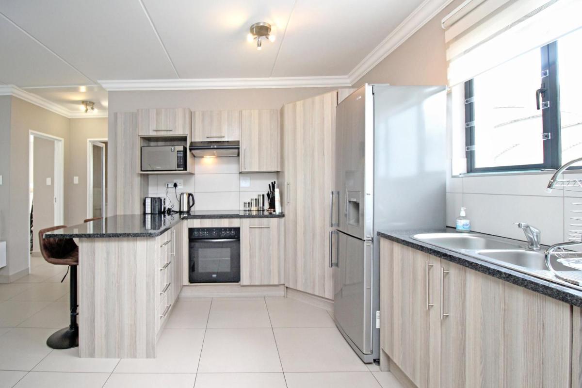 Suitetrails - White Orchid Luxury Apartment