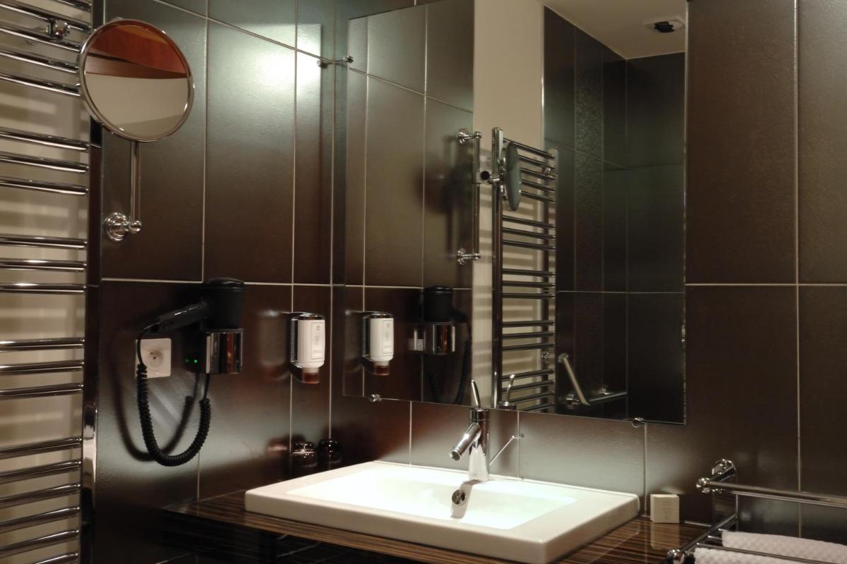 Salle de bains dans l'établissement Chez Jean