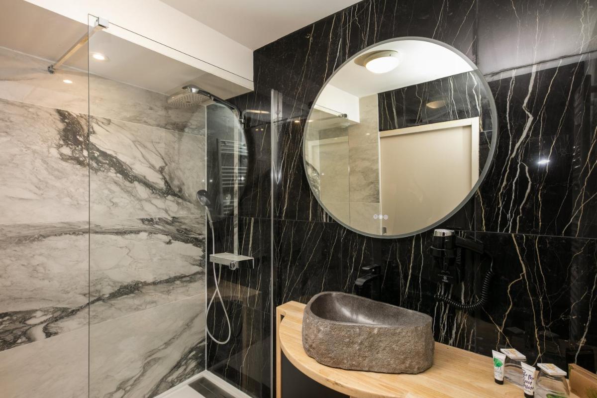 Salle de bains dans l'établissement Résidence Bellevue