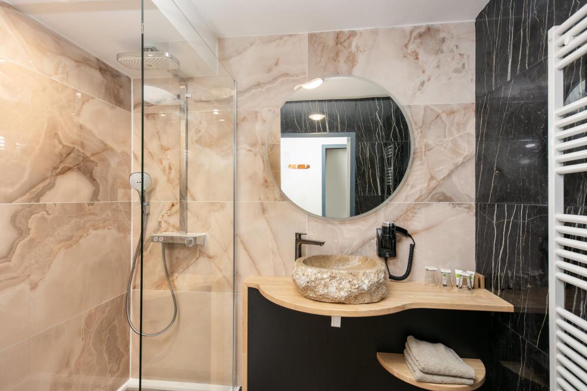 Salle de bains dans l'établissement Résidence Bellevue