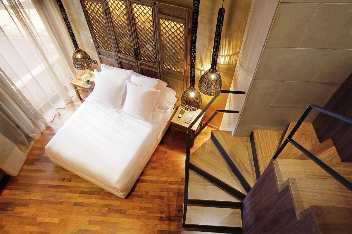 Cama o camas de una habitación en Claris Hotel & Spa GL, a Small Luxury Hotel of the World