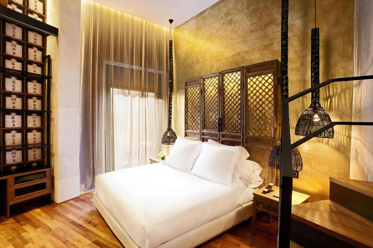 Cama o camas de una habitación en Claris Hotel & Spa GL, a Small Luxury Hotel of the World