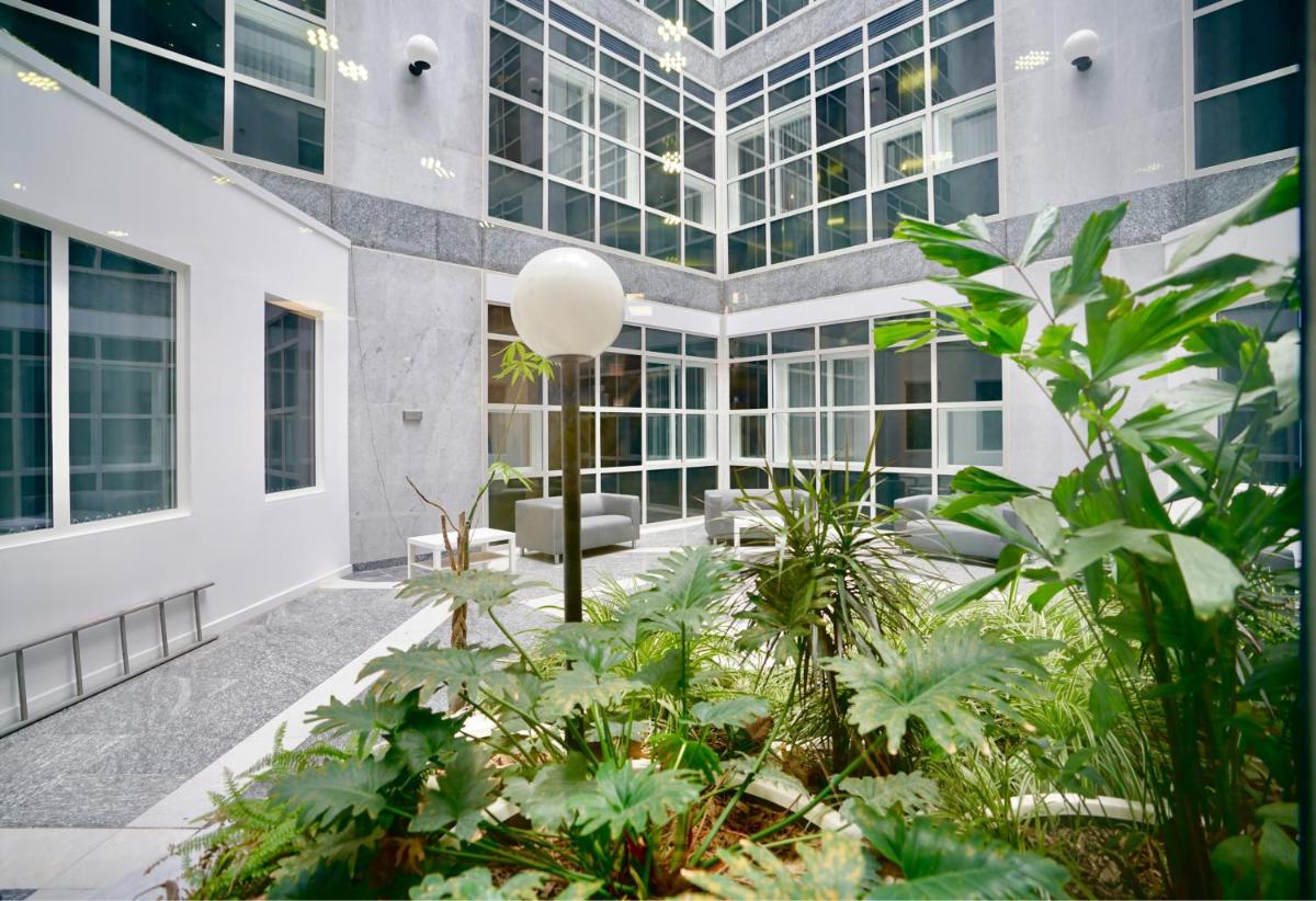 Large Balcony Apartment with City View by DH ApartHotels - Housity