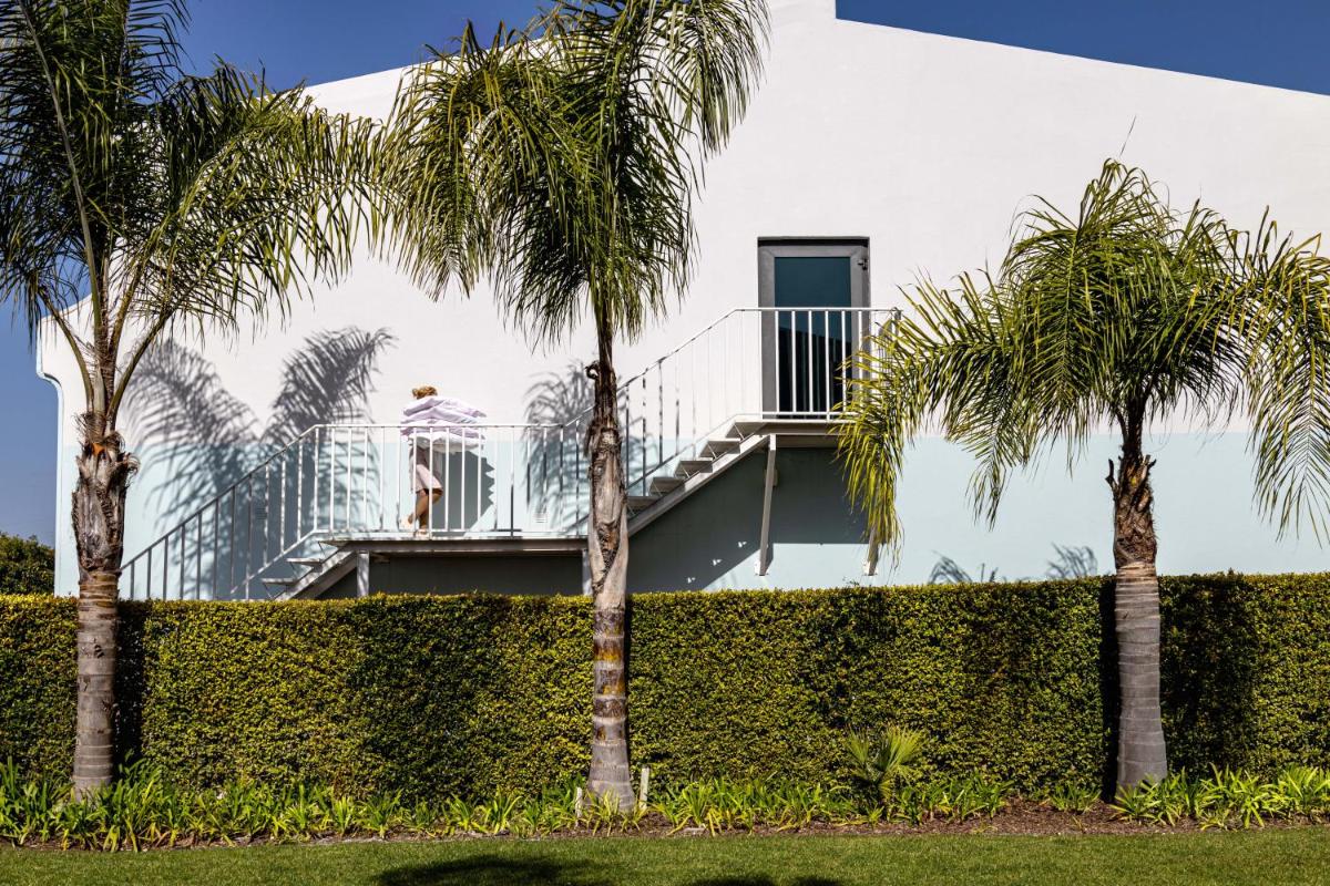 Um jardim no exterior de The Magnolia Hotel