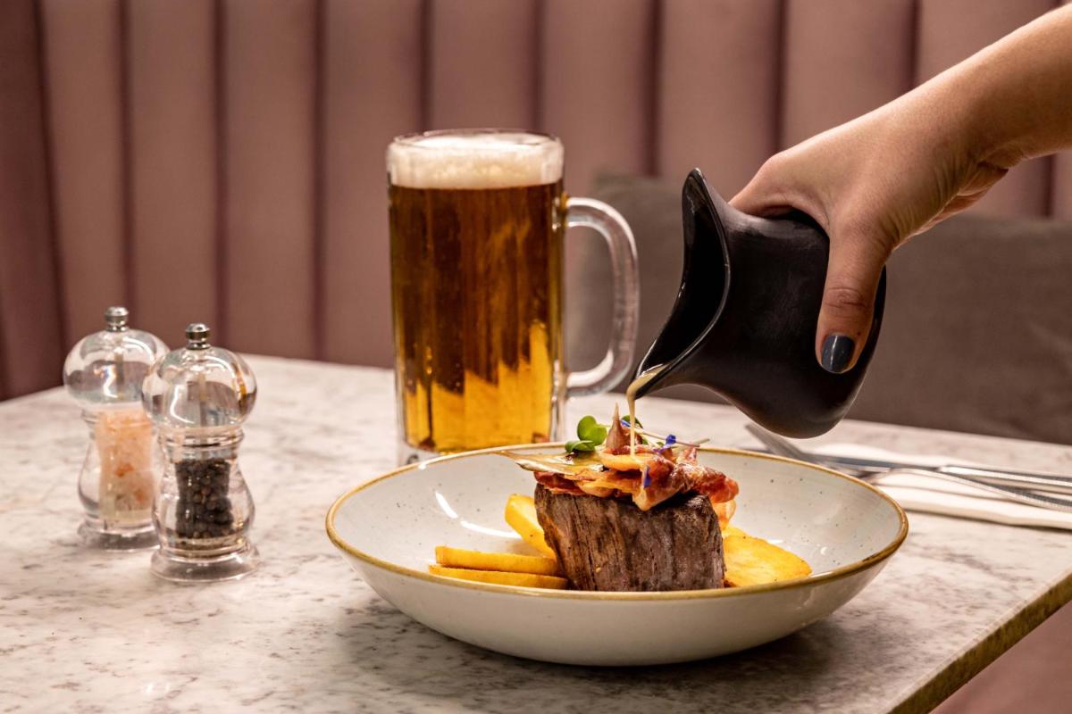 Bebidas em The Magnolia Hotel