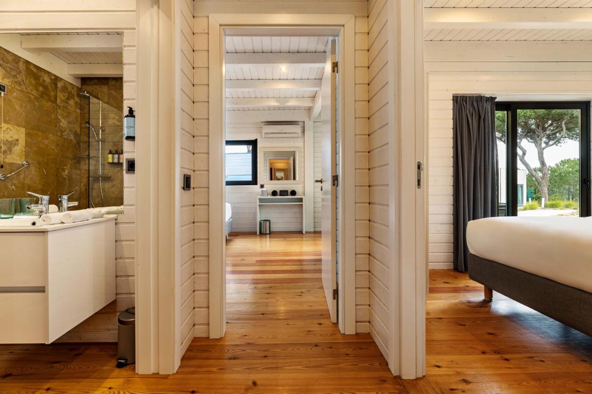 Uma cama ou camas num quarto em The Magnolia Hotel