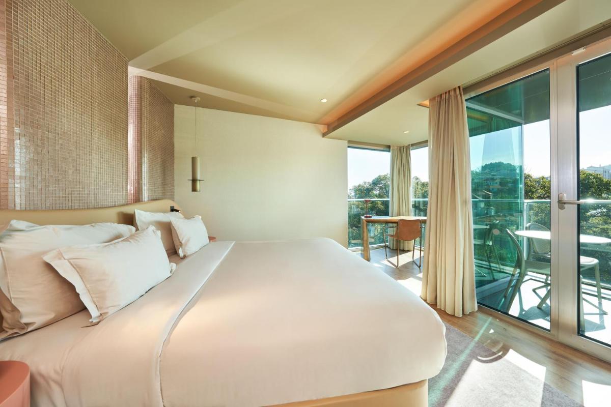 Uma cama ou camas num quarto em The Views Baia - Adults Only