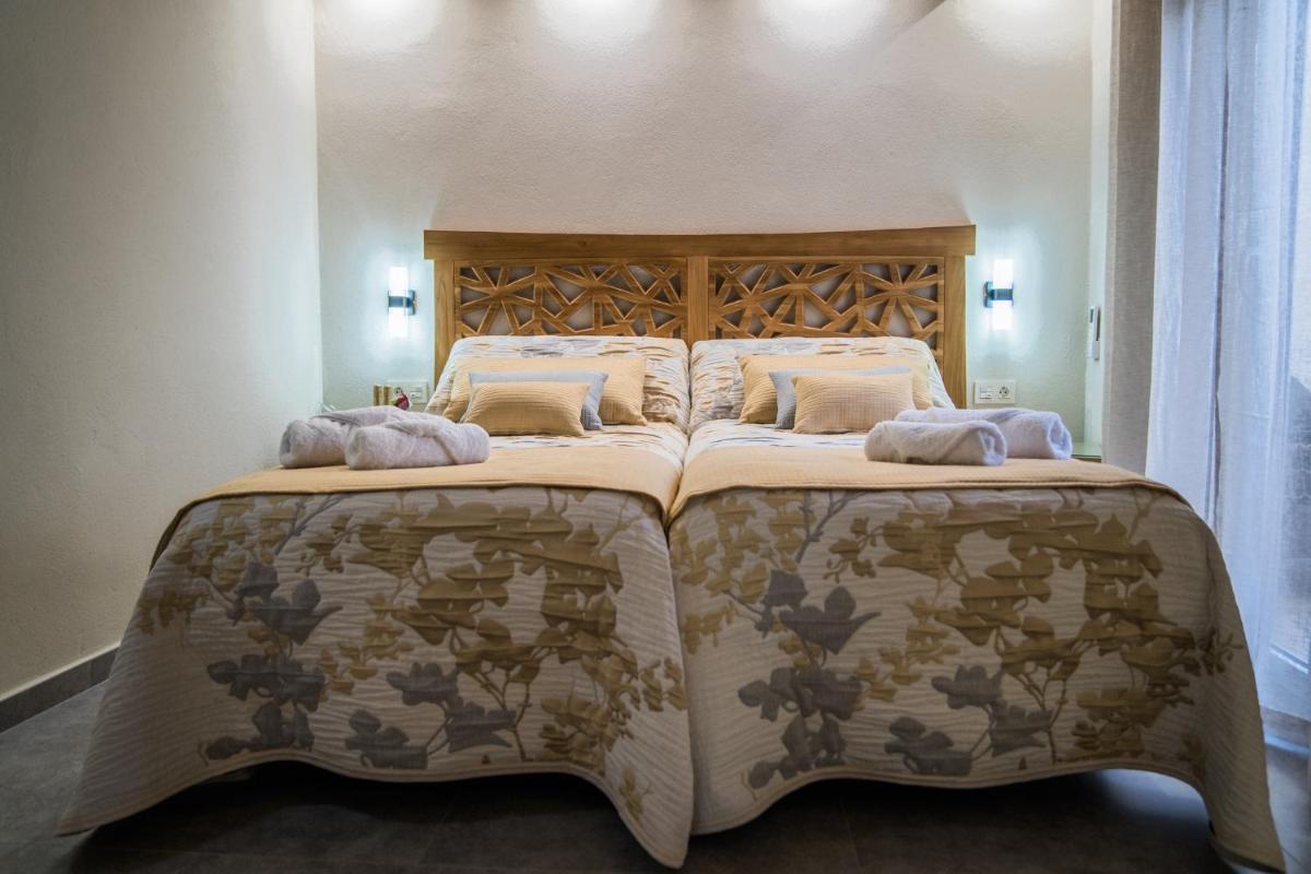 Apartamentos Turísticos El Altozano - Housity