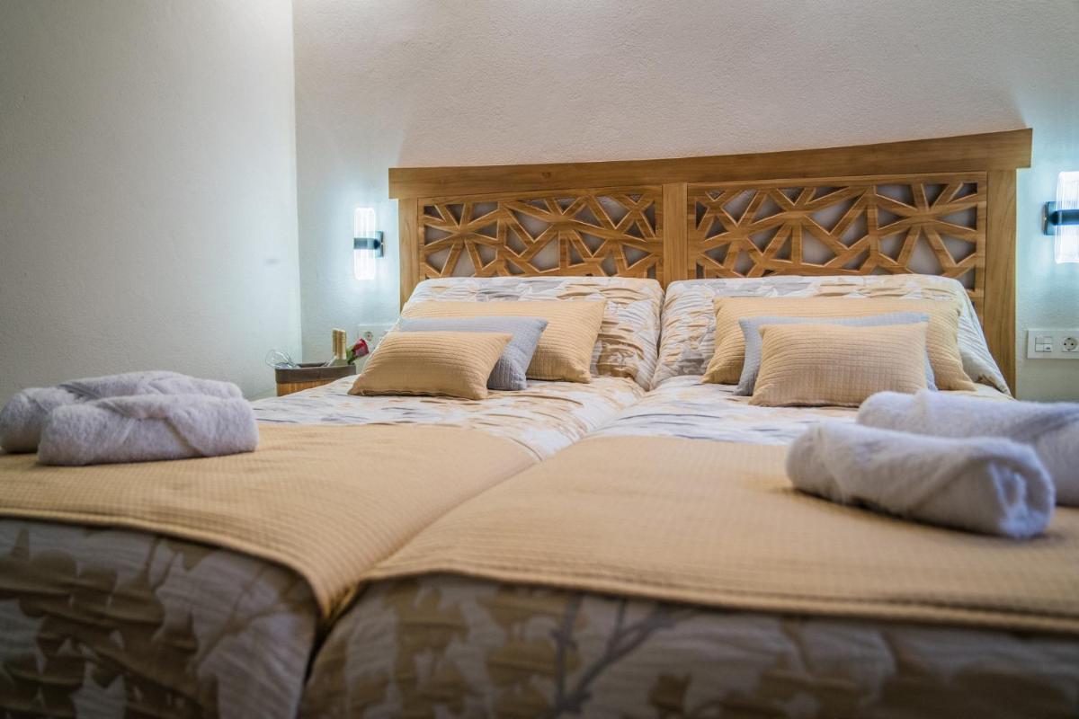 Apartamentos Turísticos El Altozano - Housity
