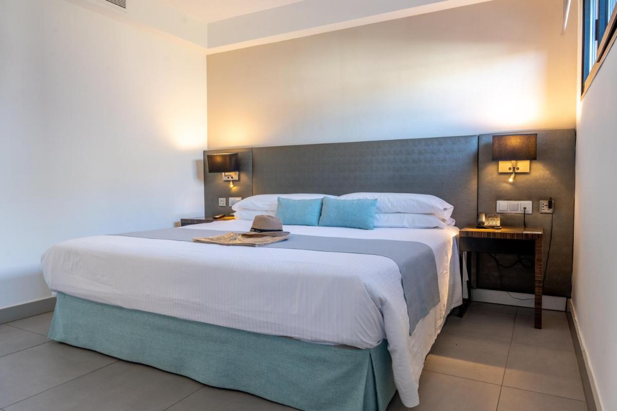 Cama o camas de una habitación en La Isla y el Mar, Hotel Boutique