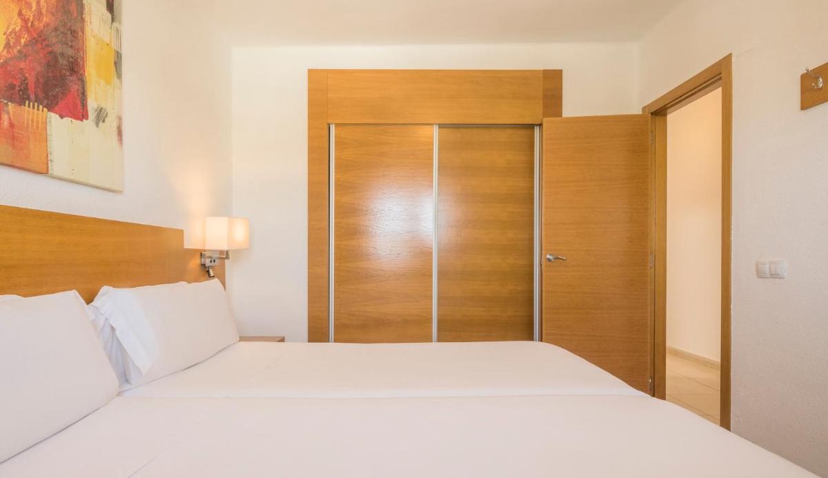 Cama o camas de una habitación en ILUNION Costa Sal Lanzarote