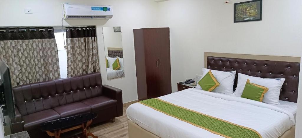 Hotel O POP Hotel Gvr Residency - Housity
