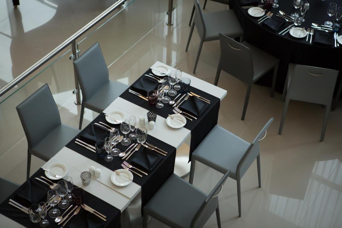 Um restaurante ou outro lugar para comer em Vila Gale Evora