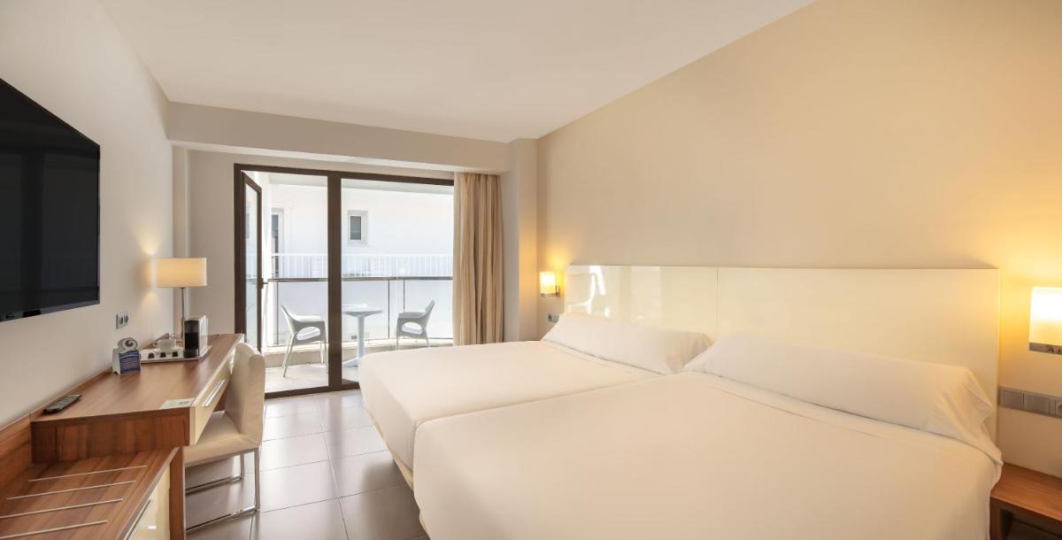 Cama o camas de una habitación en Hotel RH Portocristo & Wellness