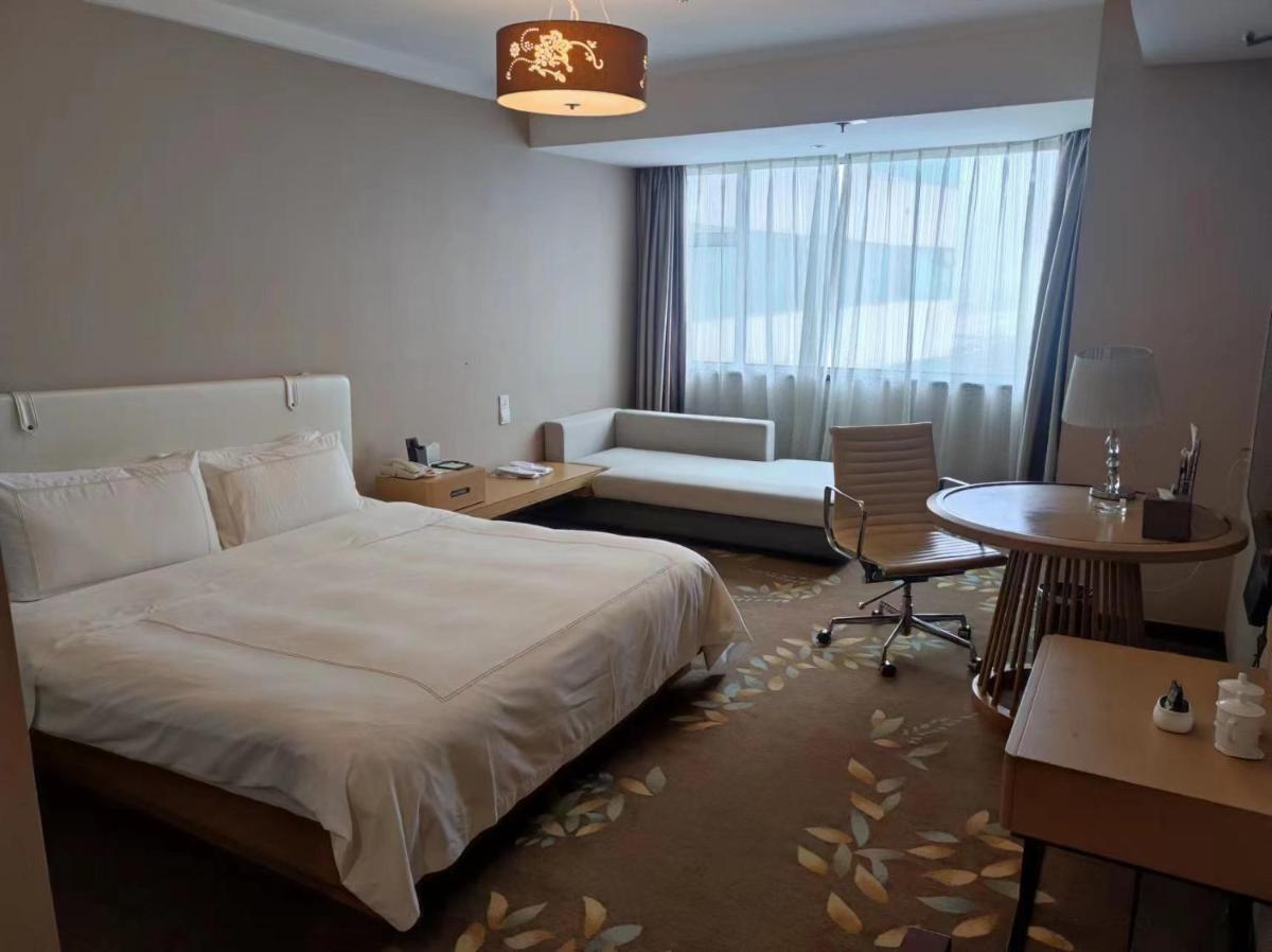 Shu Guang International Hotel - Housity