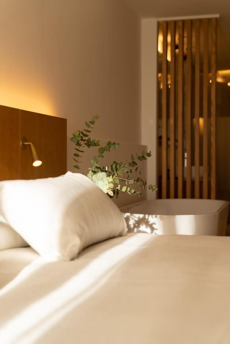 Cama o camas de una habitación en Nema Boutique Hotel & Spa