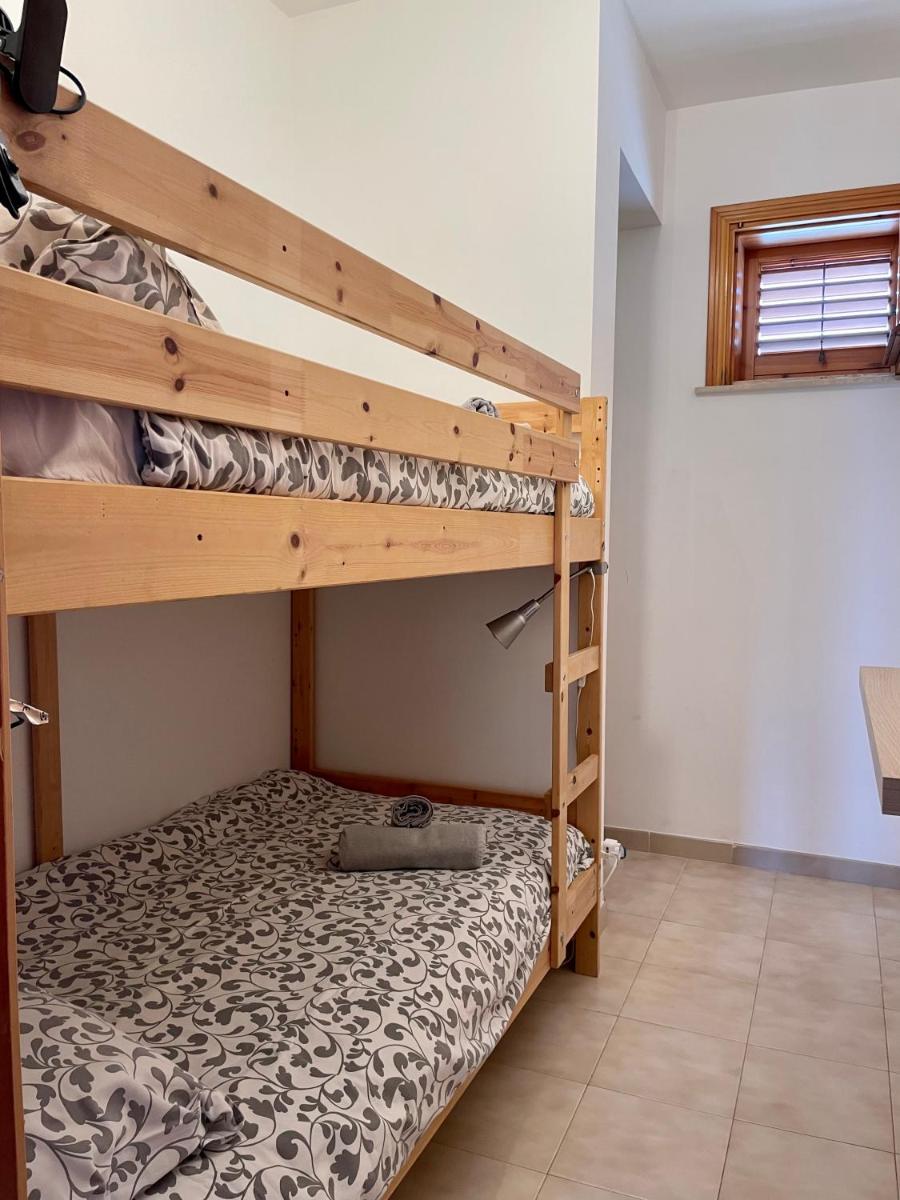 BeachFront Rooms Marina di Ragusa - Housity