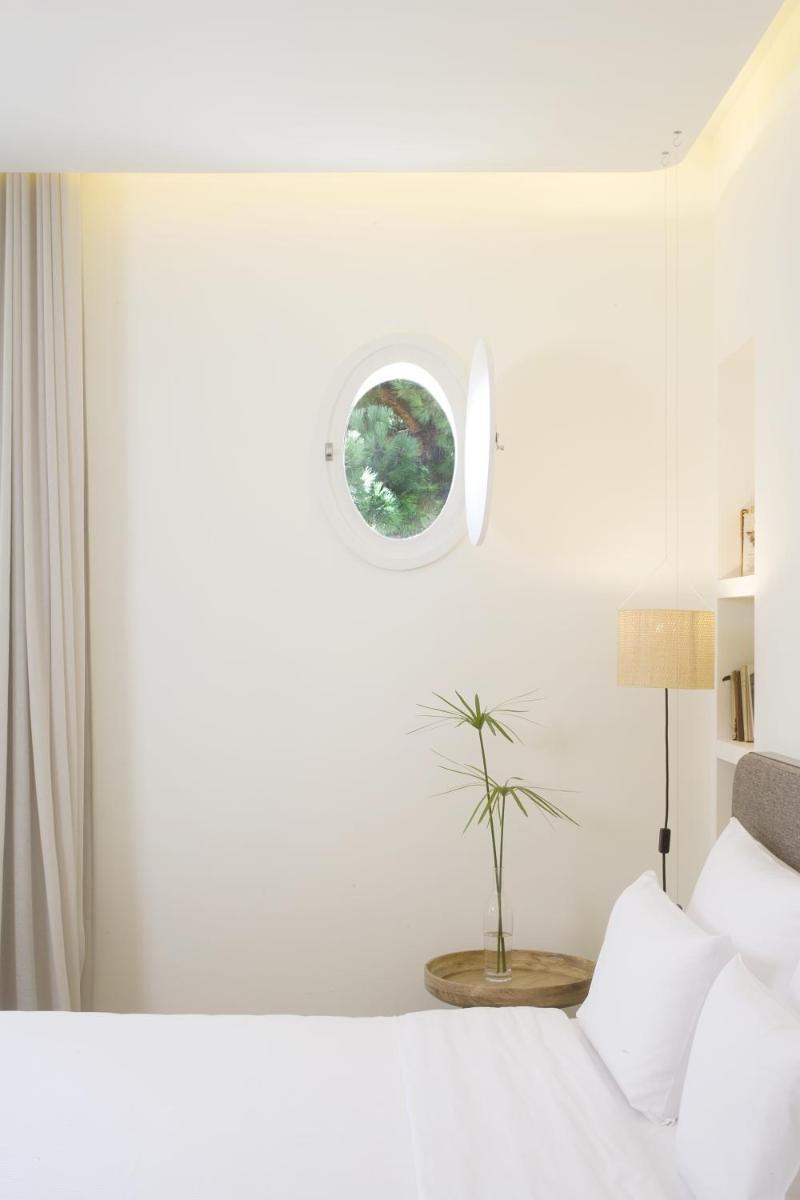 Cama o camas de una habitación en Hostal Empúries