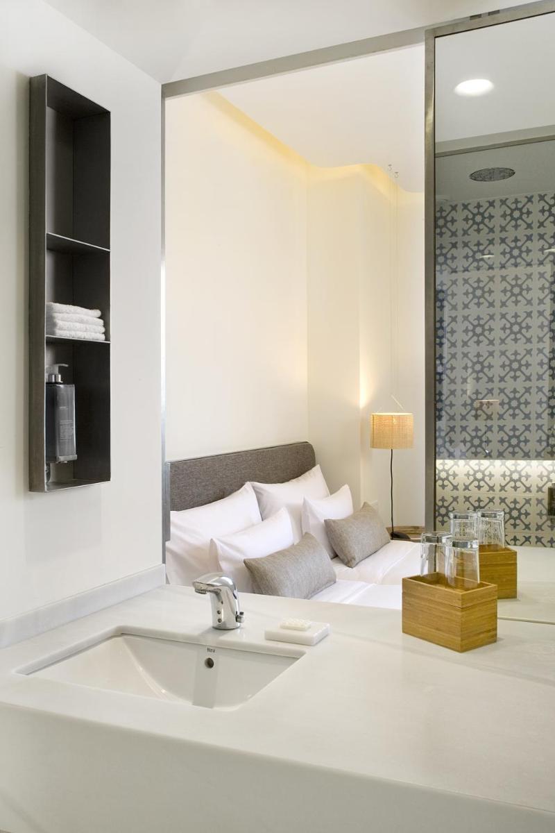 Cama o camas de una habitación en Hostal Empúries