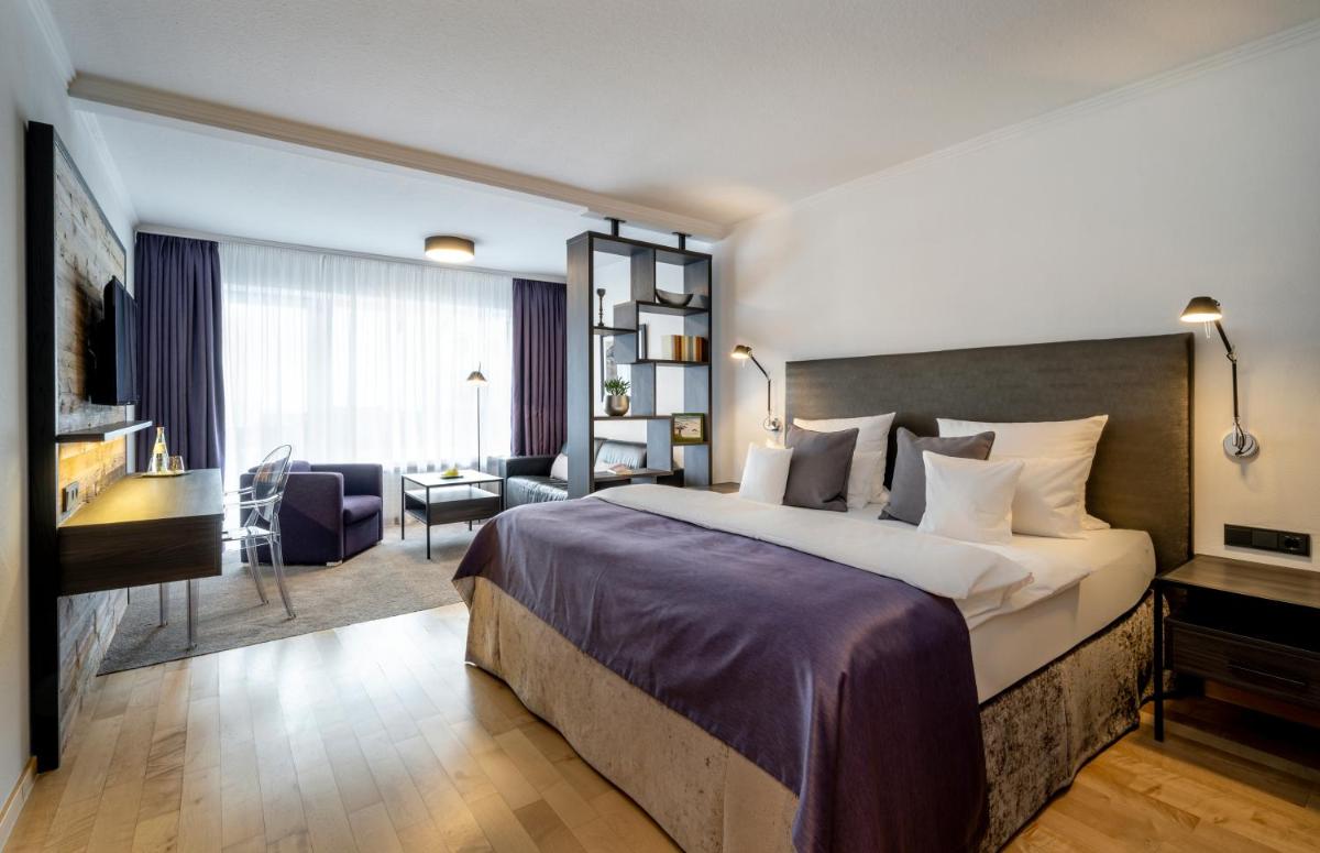 Ein Bett oder Betten in einem Zimmer der Unterkunft Hotel Franks