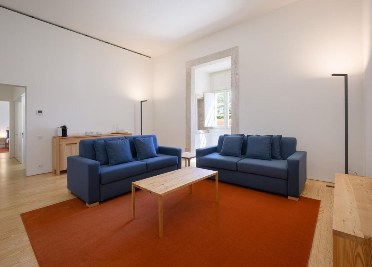 Uma área de estar em Montebelo Mosteiro de Alcobaça Historic Hotel