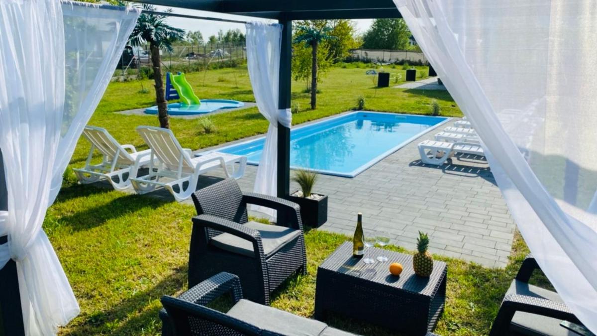 Domki Black Pearl Mielno basen sauna jacuzzi - Housity