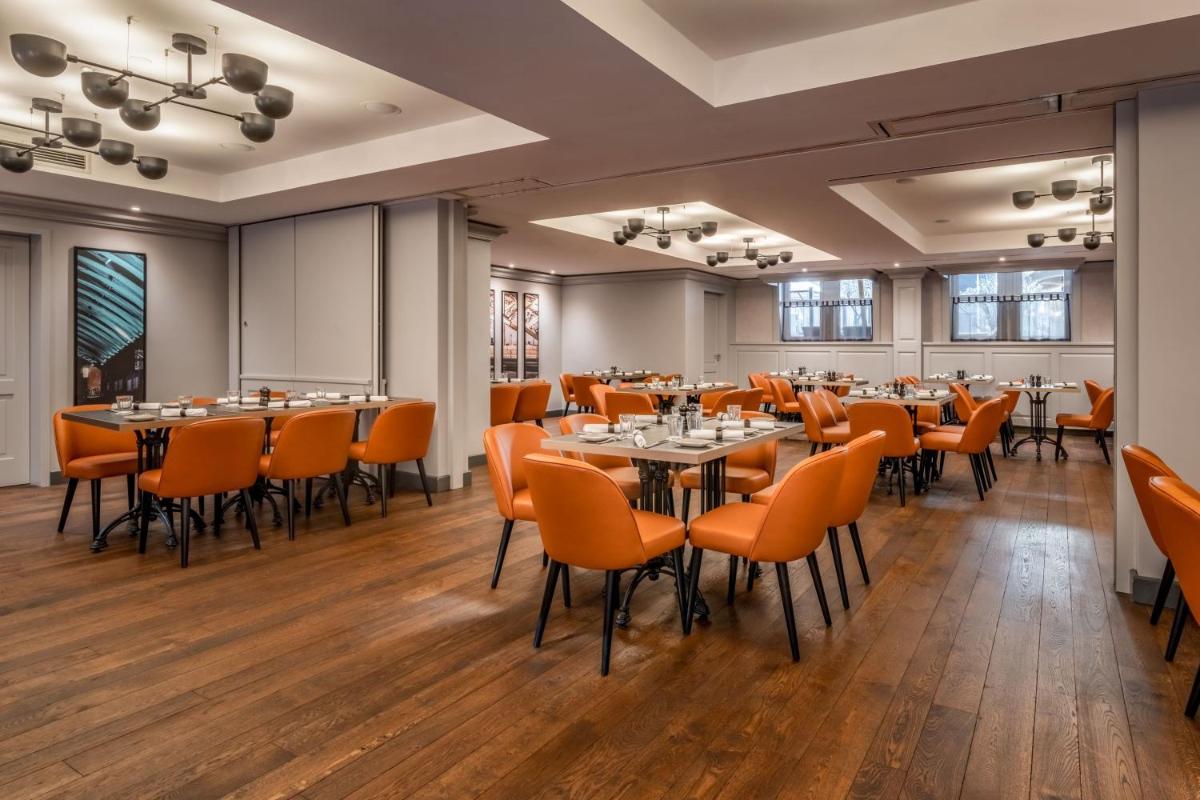 Ein Restaurant oder anderes Speiselokal in der Unterkunft Cologne Marriott Hotel Ein Restaurant oder anderes Speiselokal in der Unterkunft Cologne Marriott Hotel
