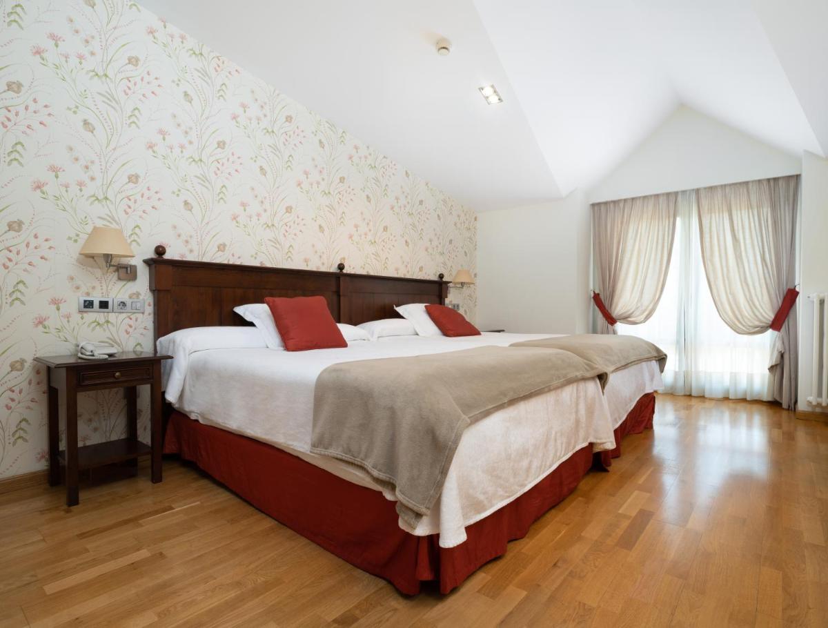 Cama o camas de una habitación en Hotel Villa Virginia