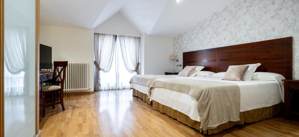 Cama o camas de una habitación en Hotel Villa Virginia