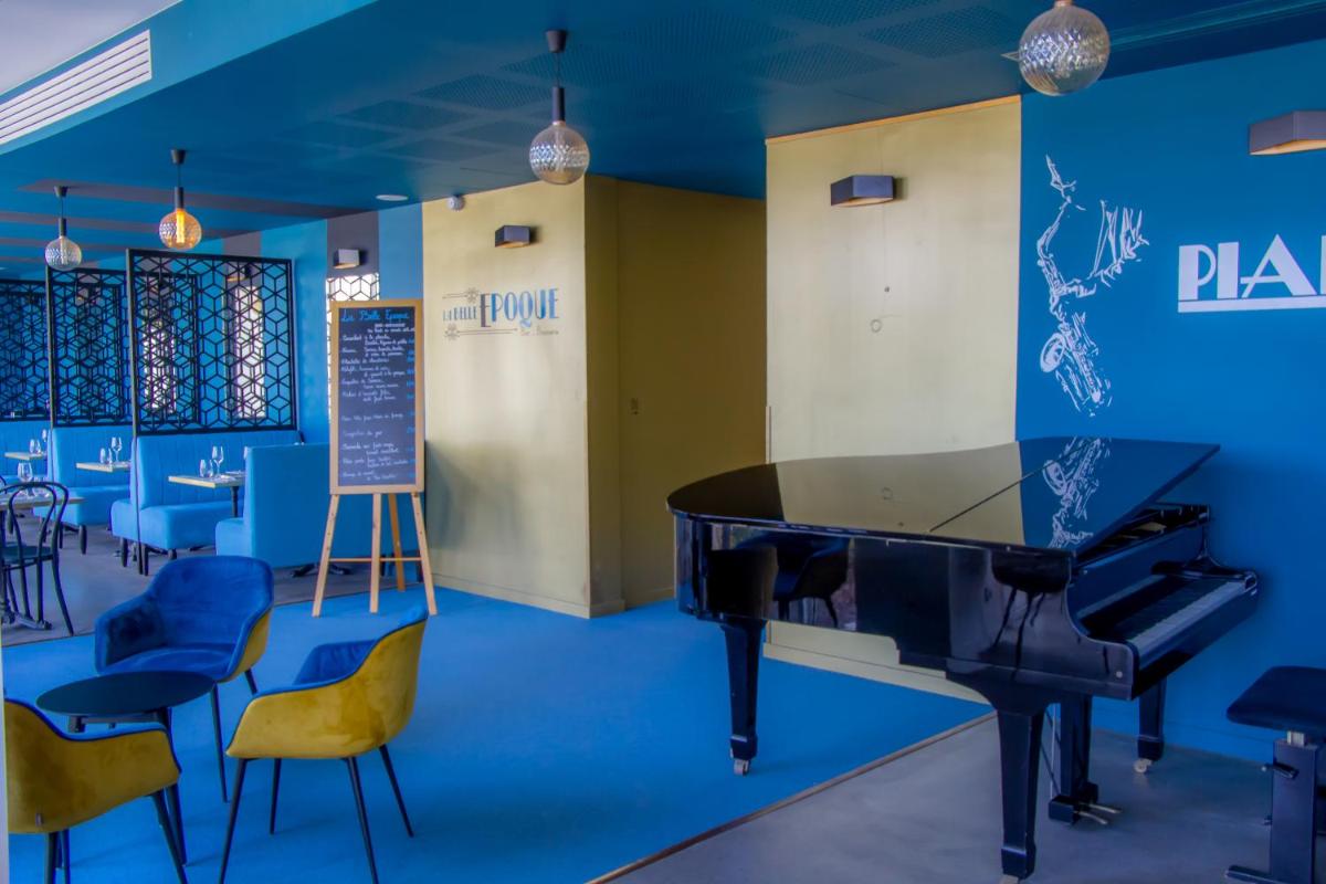 Coin salon dans l'établissement Hôtel du Parc & Spa