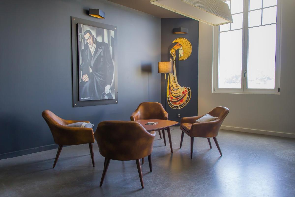 Coin salon dans l'établissement Hôtel du Parc & Spa