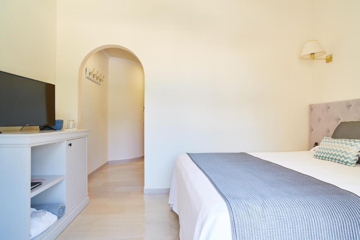 Cama o camas de una habitación en Grand Hotel Palladium Santa Eulalia del Río