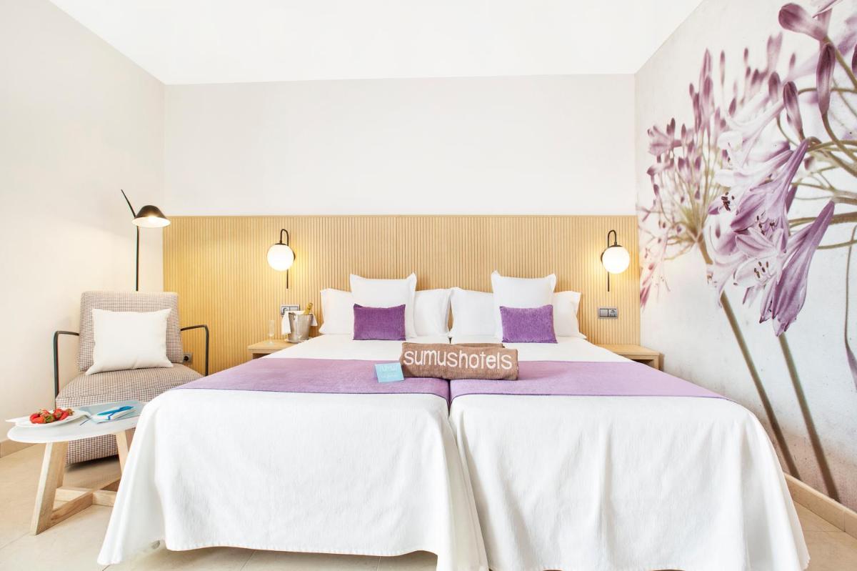 Cama o camas de una habitación en Sumus Hotel Monteplaya & SPA 4Sup - Adults Only