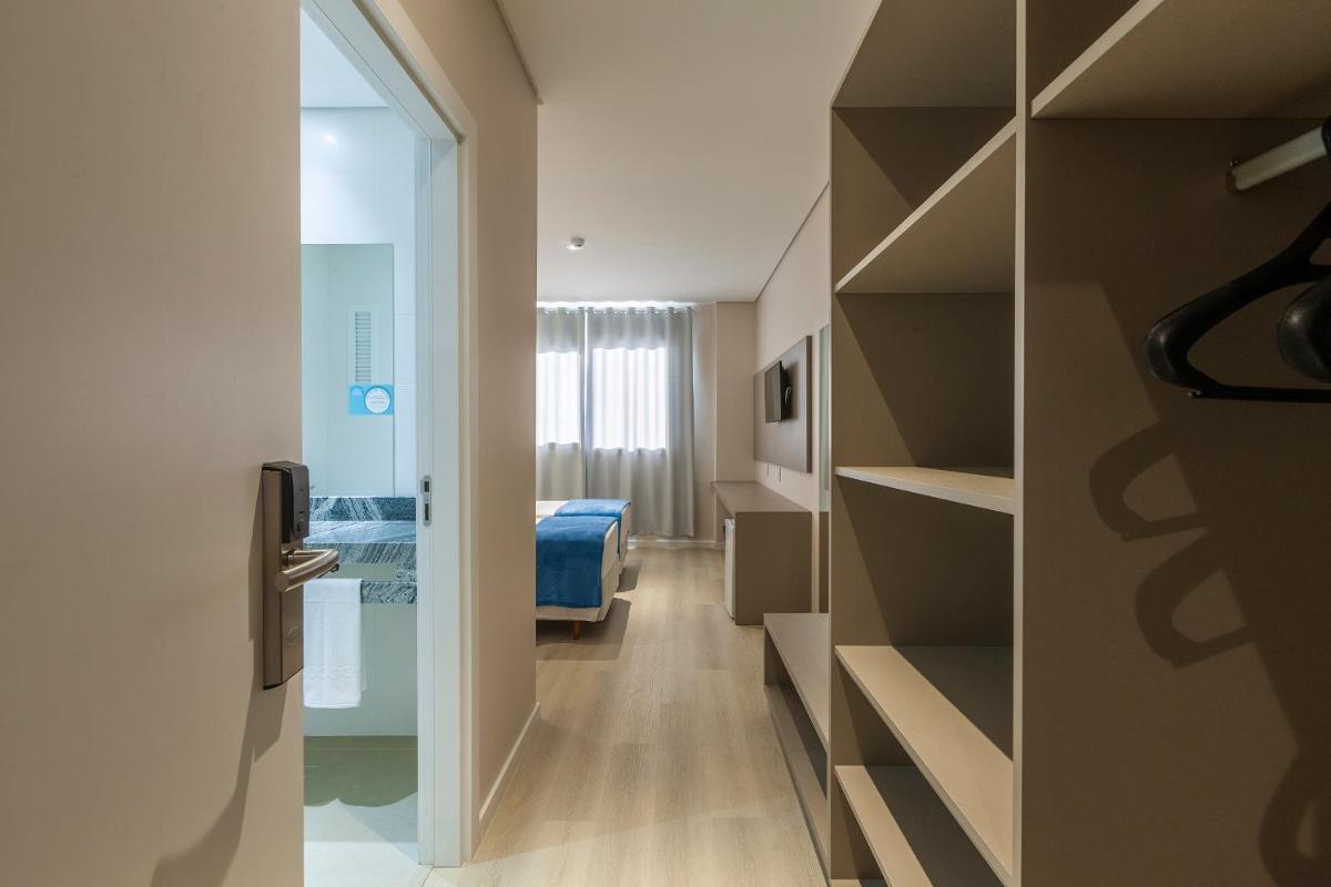 Tri Hotel Executive Osório - Housity