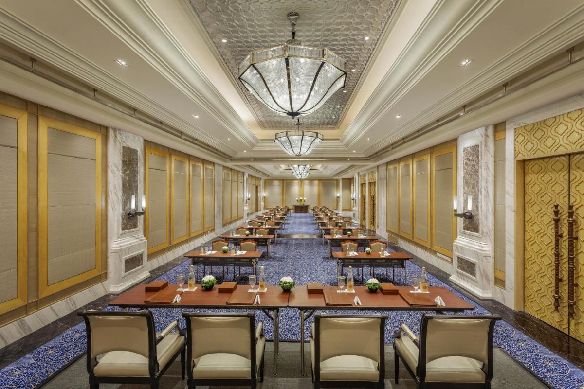 a large dining room with a long table at ITC Royal Bengal, a Luxury Collection Hotel, Kolkata in Kolkata