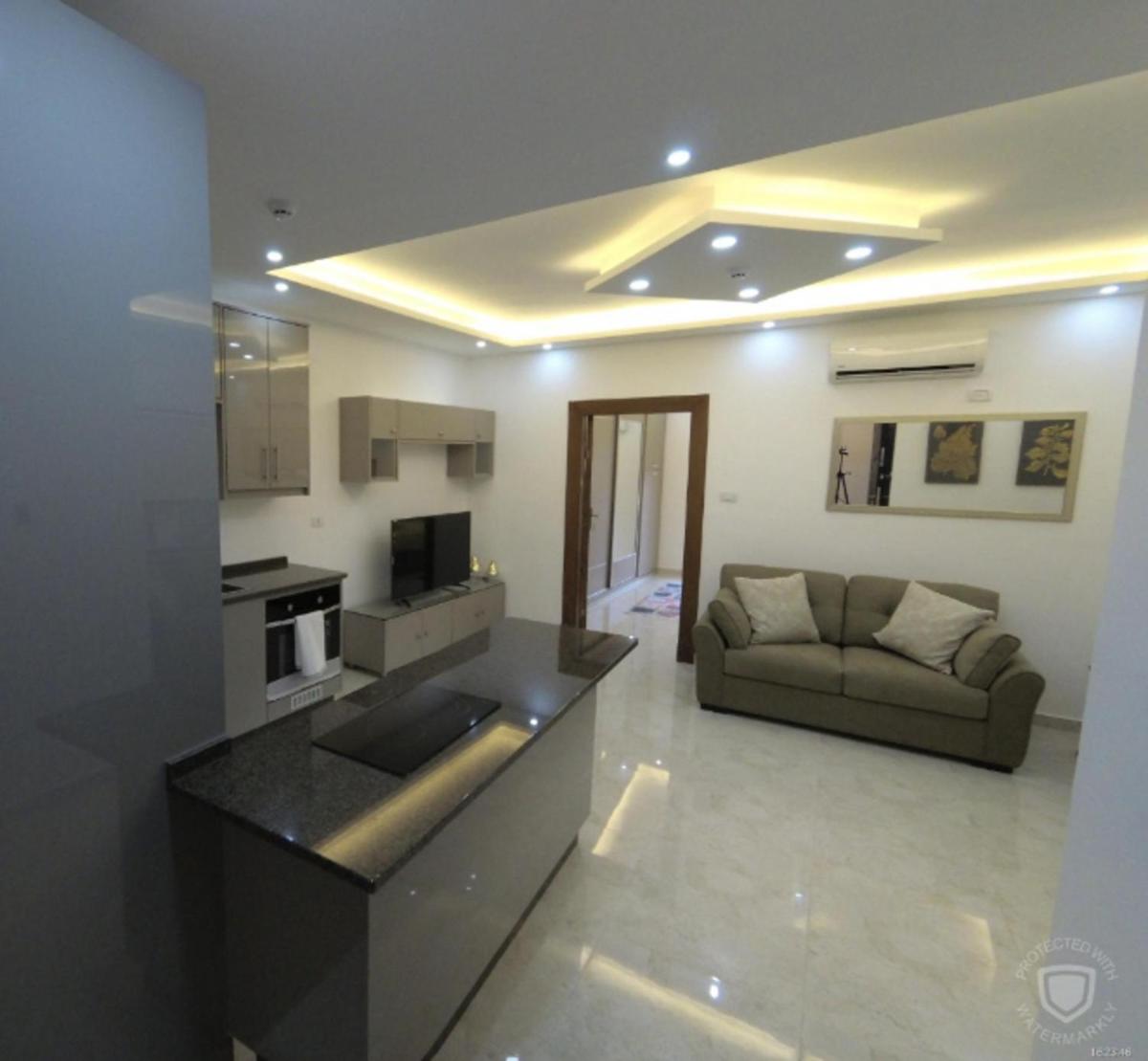 Suitetrails - Amazing one Bedroom Apartment in Amman Elwebdah 1