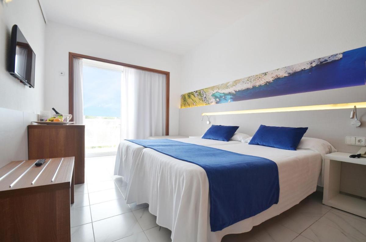 Cama o camas de una habitación en azuLine Hotel Bergantin