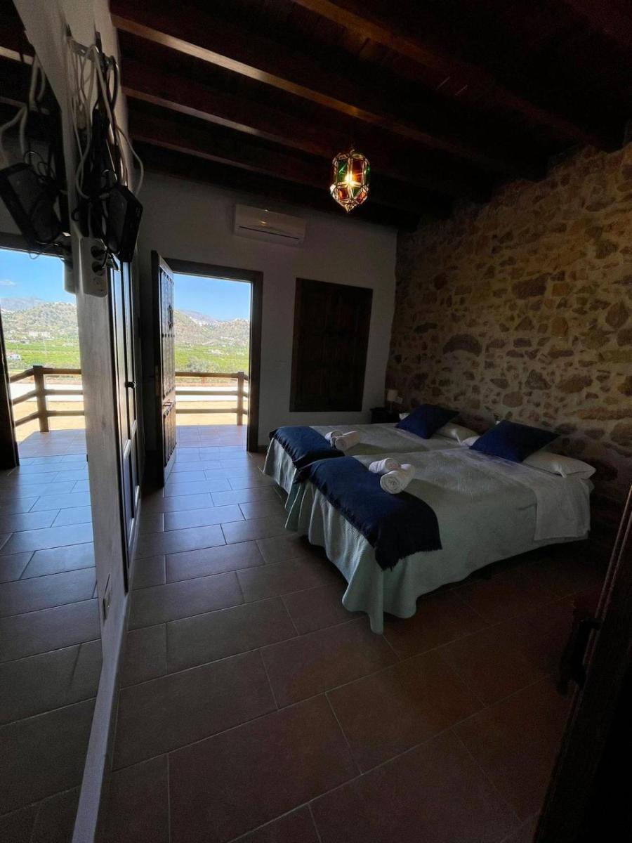 Habitación rural en Posada Los Caballos - Housity