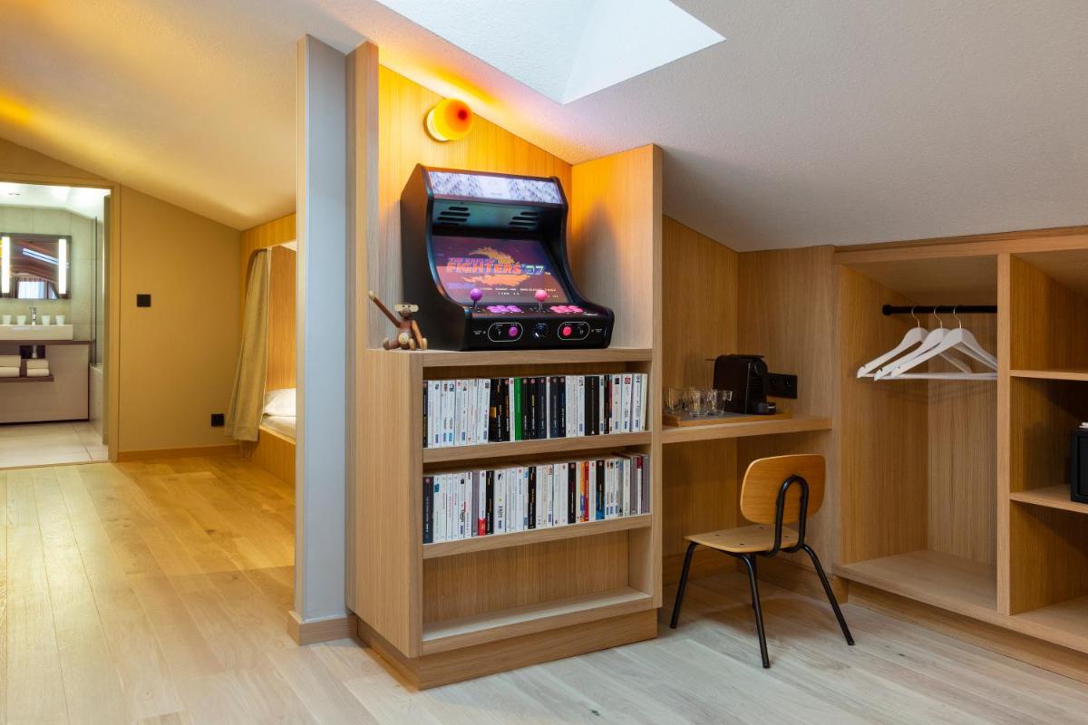 Télévision ou salle de divertissement dans l'établissement Heliopic Hotel & Spa