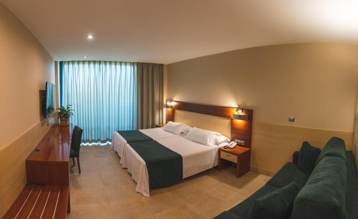 Cama o camas de una habitación en Hotel Deloix 4* Sup