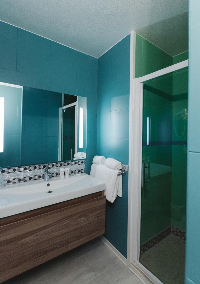 Salle de bains dans l'établissement Ostella Spa & Resort