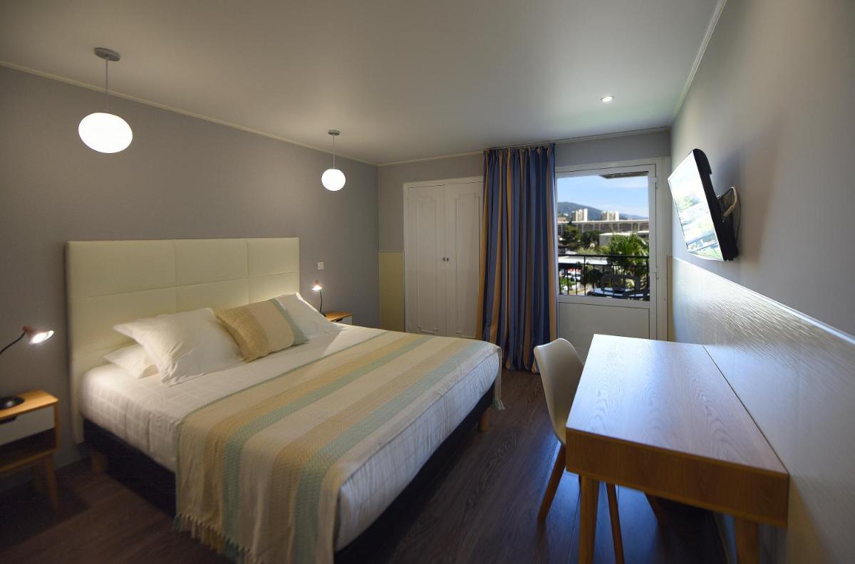 Un ou plusieurs lits dans un hébergement de l'établissement Ostella Spa & Resort