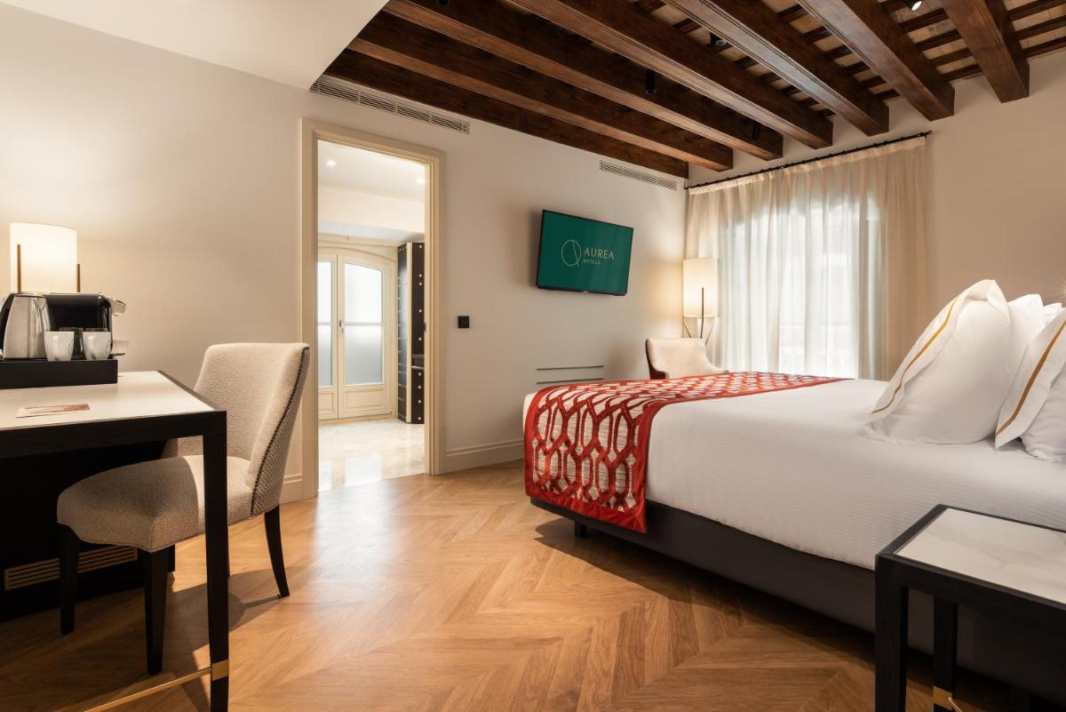 Cama o camas de una habitación en Áurea Casa Palacio Sagasta by Eurostars Hotel Company